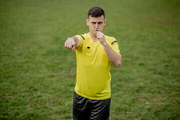 Referee indicates a violation of the rules. Concept of sport, rules violation, controversial...