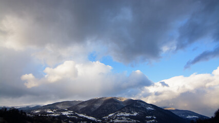 Fototapeta na wymiar Landscape clouds over the mountains