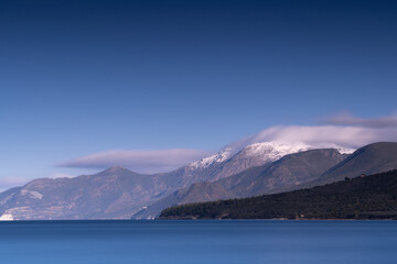Blue sea and snow covered mountains of the Cap Corse.