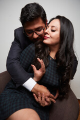 elegant young latin couple in studio
