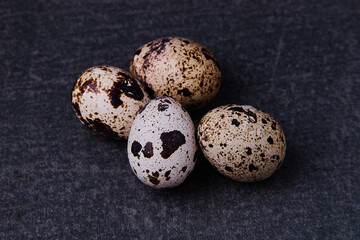 close view of four beauty quail eggs