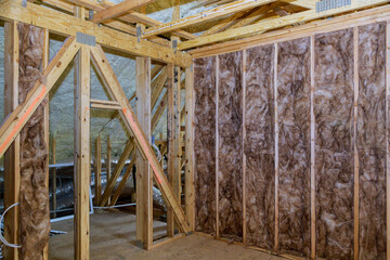 Insulation in the sloping attic of a new frame house