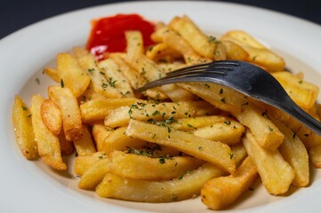 French fries are dishes made from pieces of potatoes fried in hot cooking oil. French fries are cut into lengths and fried in a submerged state in hot cooking oil called French fries