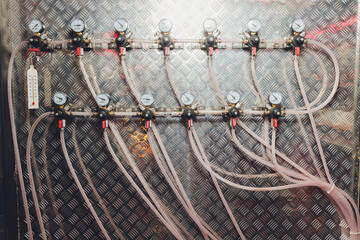 different electrical wires and sensors as part of a brewery piping systems and temperature and...