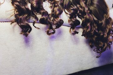 Young woman lying on the sofa with her hair in her room.