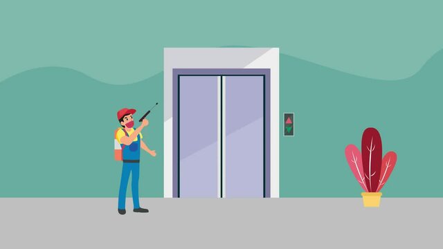 Janitor spraying disinfectant on the lift door