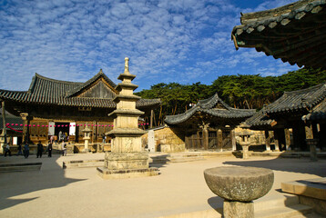 Obraz premium The three Jewel Temples of South Korea represent the three jewels of Buddhism: Buddha, dharma, and sangha. Near Yangsan, Tongdosa Temple (seen here), represents Buddha.