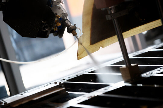 A Modern Water Laser Cuts Carbon Fiber At An Aircraft Factory