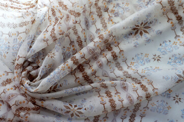 Texture background, women's shawl. Pure silk scarf. Top view.Fashion concept.