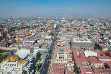 Fototapeta na wymiar Historic center of Mexico City and Eje Central Lazaro Cardenas Avenue aerial view, from Torre Latinoamericana, Mexico City, Mexico. Historic center of Mexico City is a World Heritage Site.