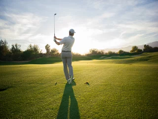 Gordijnen Golfer in Fairway at Sunset © Terry