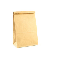 Brown kraft paper bag isolated on a white background..