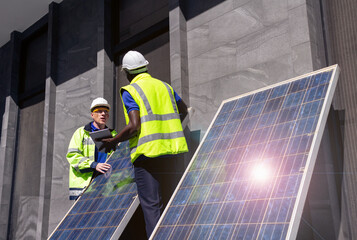 Engineer checking solar panels for rooftop installation 