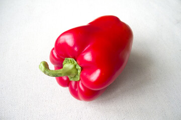 Bright red pepper isolated on white.