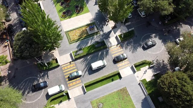 Aerial Drone Panoramic view of Busy Street in the City with Stop signs and zebra crosswalk