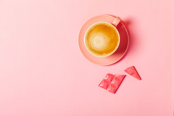 cup of coffee and pink chocolate