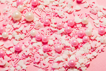 pink sugar sprinkles or confetti closeup