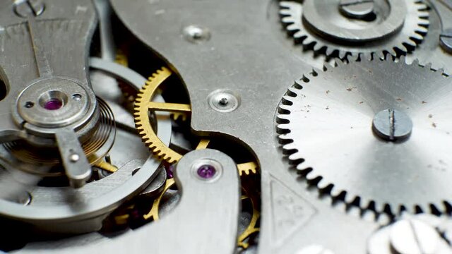 Detail of clockwork with gear. Old clock mechanism works. Successful business or teamwork concept