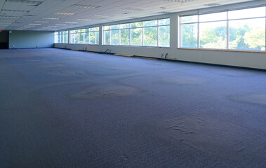 empty office building interior with furniture removed before renovation