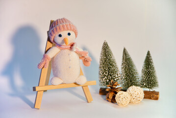 snowman on a wooden fence