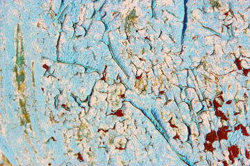 Textured metal surface with detailed corrosion, rust and scratches. Rusty metal wall, painted metal with rust texture. Rusty metal background with streaks of rust. Rust stains. Metal surface with