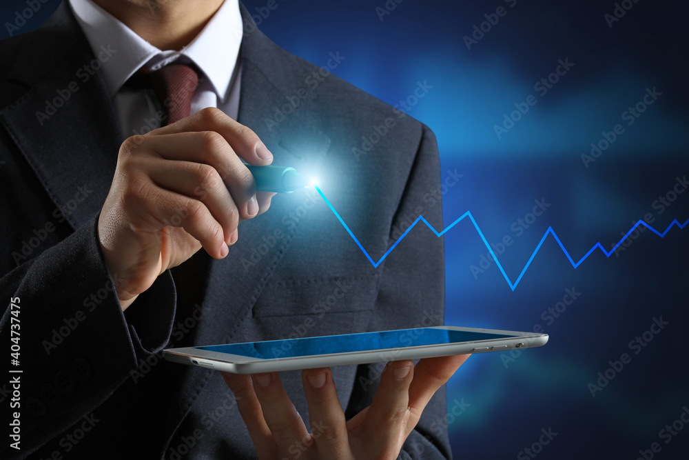 Poster business consultant with tablet computer using virtual screen on dark background