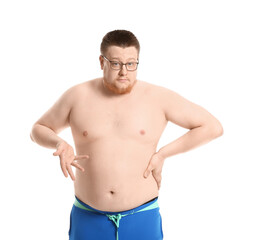 Fototapeta premium Confused overweight man on white background. Weight loss concept