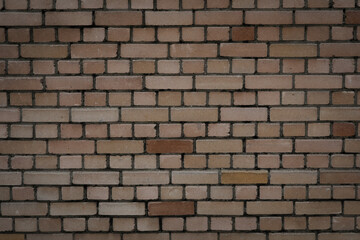 Obraz premium Big red brown brick wall with rough and uneven, bricklayer for a backdrop and template with space for text, no person