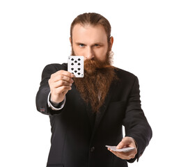 Male magician with cards on white background