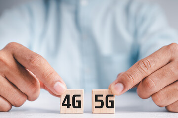 Wooden cube handle to turn 4G into 5G  (5th Generation), technology turns the transition to high speed and the Internet of things.