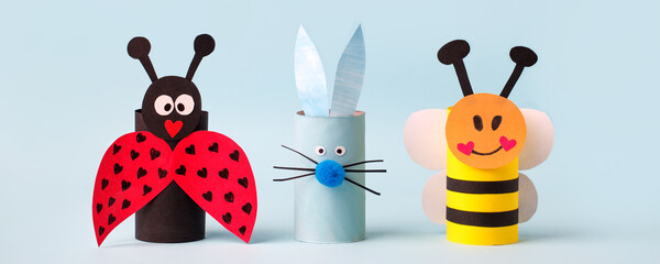 Happy easter spring toy collection on blue background for kids holiday party concept background....