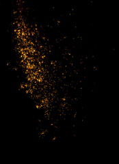 Fototapeta na wymiar blurry sparks from fireworks on black background