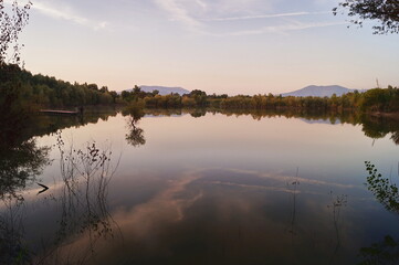 Lake in Renai park at sunset, Tuscany, Italy