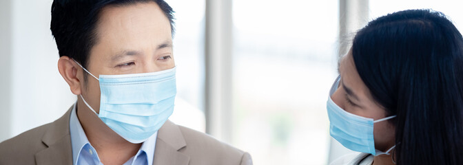 Business people wearing medical mask protect against airborne disease for prevent infection...