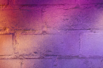 Art under ground. Beautiful street art graffiti background. The brick wall is decorated with abstract drawings house paint. Modern style urban culture of street youth. Abstract picture on wall