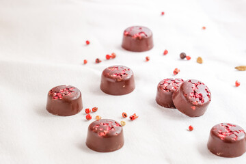 Chocolates isolated on white. Valantine's Day concept. Selective focus