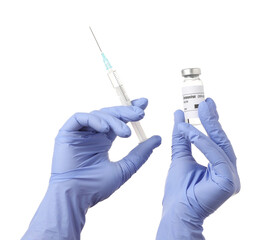 Doctor's hands with syringe and vaccine for immunization against COVID-19 on white background
