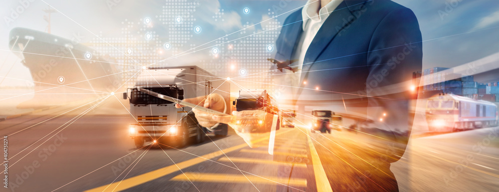 Aufkleber Businessman using tablet on logistic network distribution and smart transportation and networking intelligent logistics of truck and train container cargo ship, Logistic import export and industry.