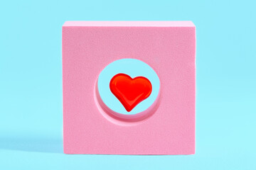 Red heart in abstract pink figure.