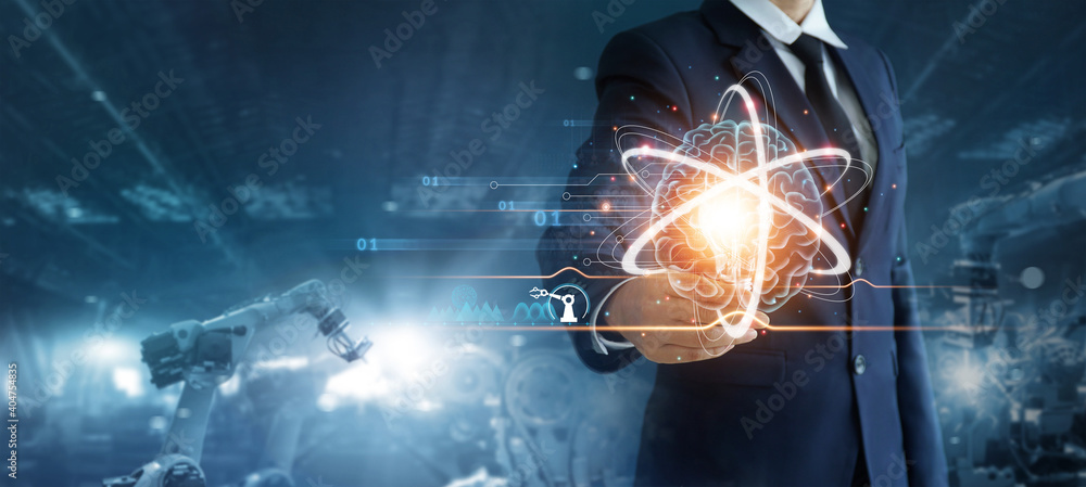 Poster Engineer holding light bulb with brain and control robotics automatic arms machine in factory automotive industrial. Digital manufacturing operation. Science and creativity. AI. Machine learning.