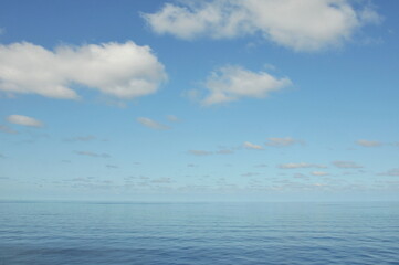 Clouds over the calm Atlantic ocean