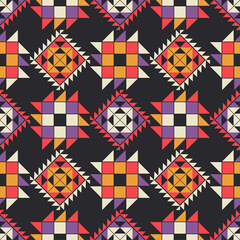 Aztec elements. Shapes made of triangles. Boho texture. Seamless pattern. Textile. Vector illustration for web design or print.