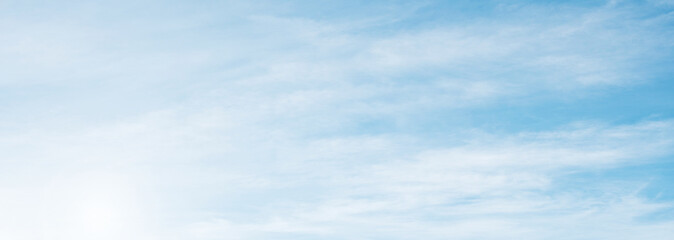 Summer Blue Sky and white clouds background. Beautiful clear cloudy in sunlight spring season. Panorama vivid cyan cloudscape in nature environment. Outdoor horizon skyline with spring sunshine.