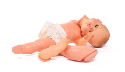 Broken old doll, isolated