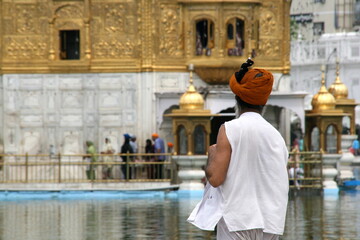 Pilgrim at the golden temple in the city of Amritsar-India