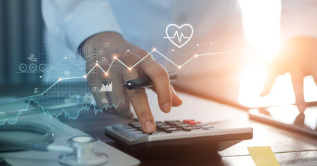 Healthcare business graph data and growth, Doctor use calculator and calculate healthcare costs and...