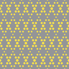 Illuminating yellow and ultimate gray geometric seamless rhombus pattern. Abstract diamond vector pattern of dots. Simple vector illustration. Geometric design for fabric, wallpaper, scrapbooking