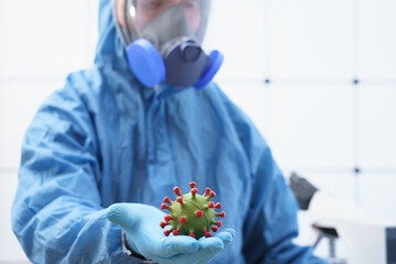 Coronavirus in doctor hand.