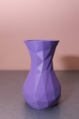purple vase, printed on a 3D printer. 3D printing