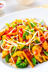 sweet and sour chicken with rice and vegetables